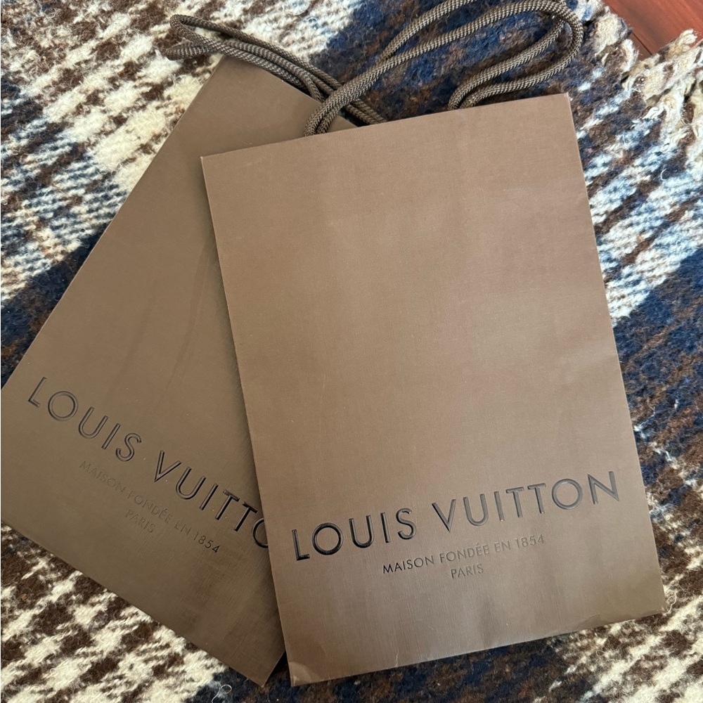 Brown Louis Vuitton shopping bag